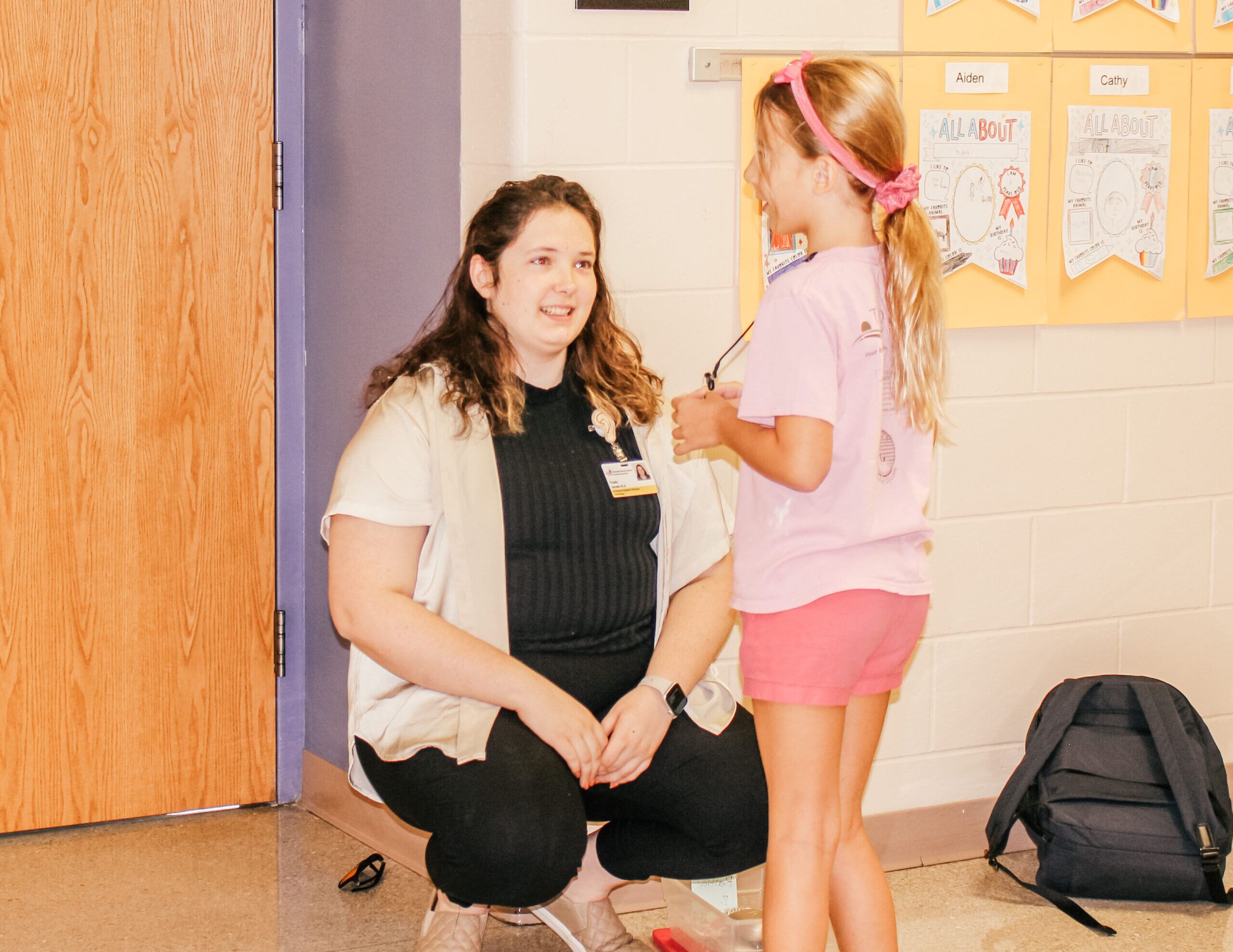 Trudy Jacobs working with Student